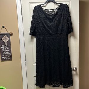 Black lace dress. 4x similar to size 24/26. Satin lined. Has pockets.